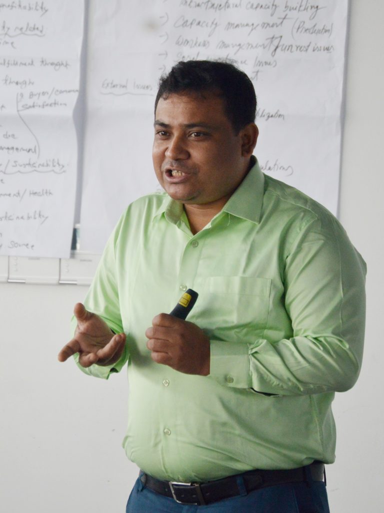 photo of man giving presentation