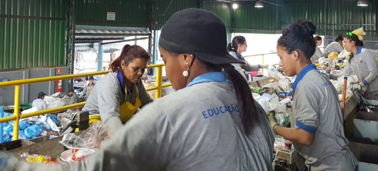 Workers sort recycling