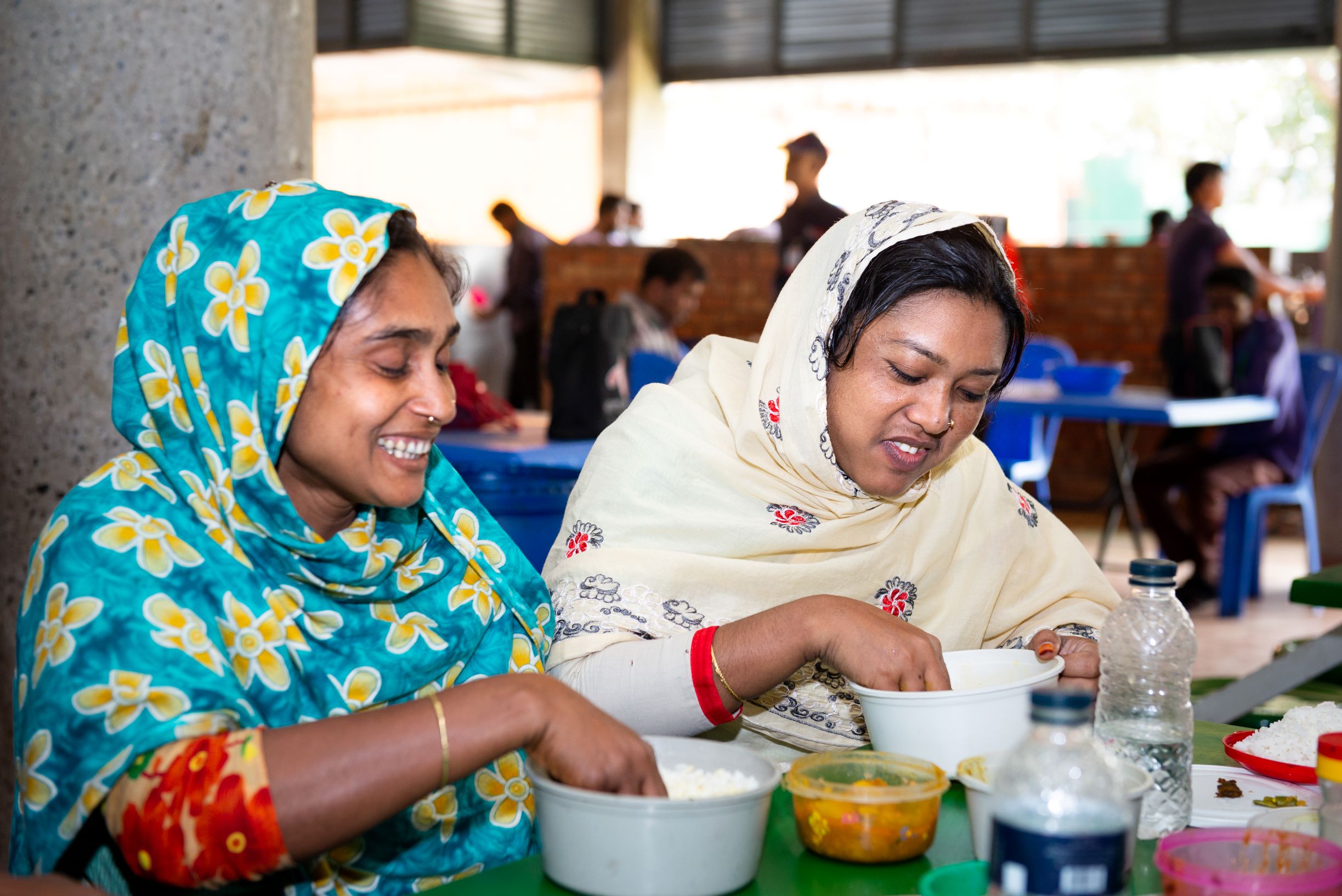 photo of women eating cafeteria