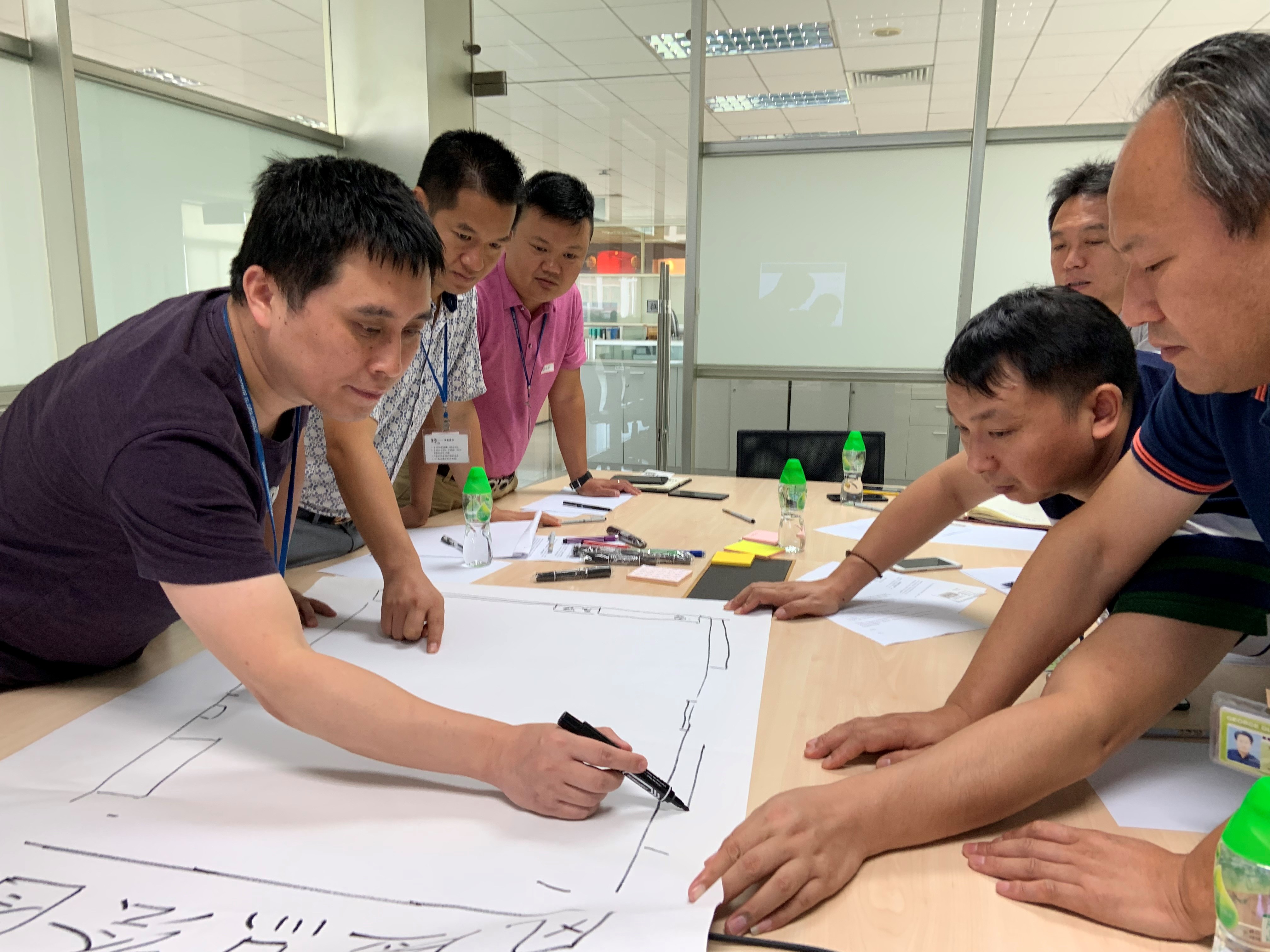 photo of people working at conference table