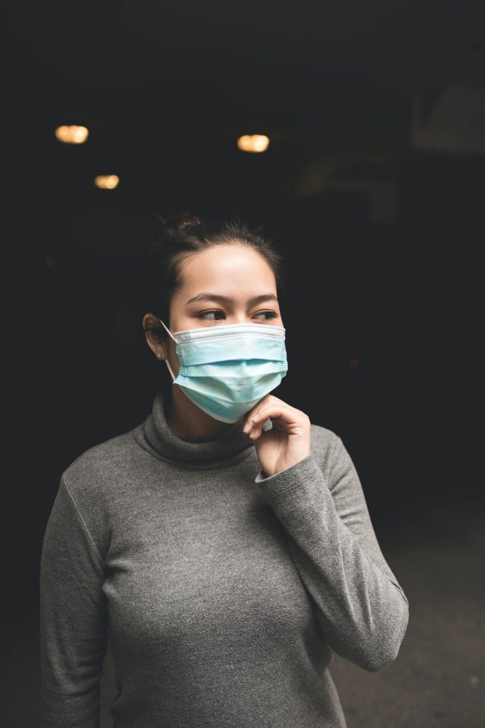 photo of woman wearing face mask