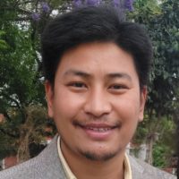 headshot photo of Ganesh Thapa