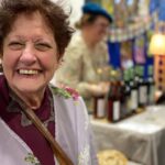 A woman smiles for the camera